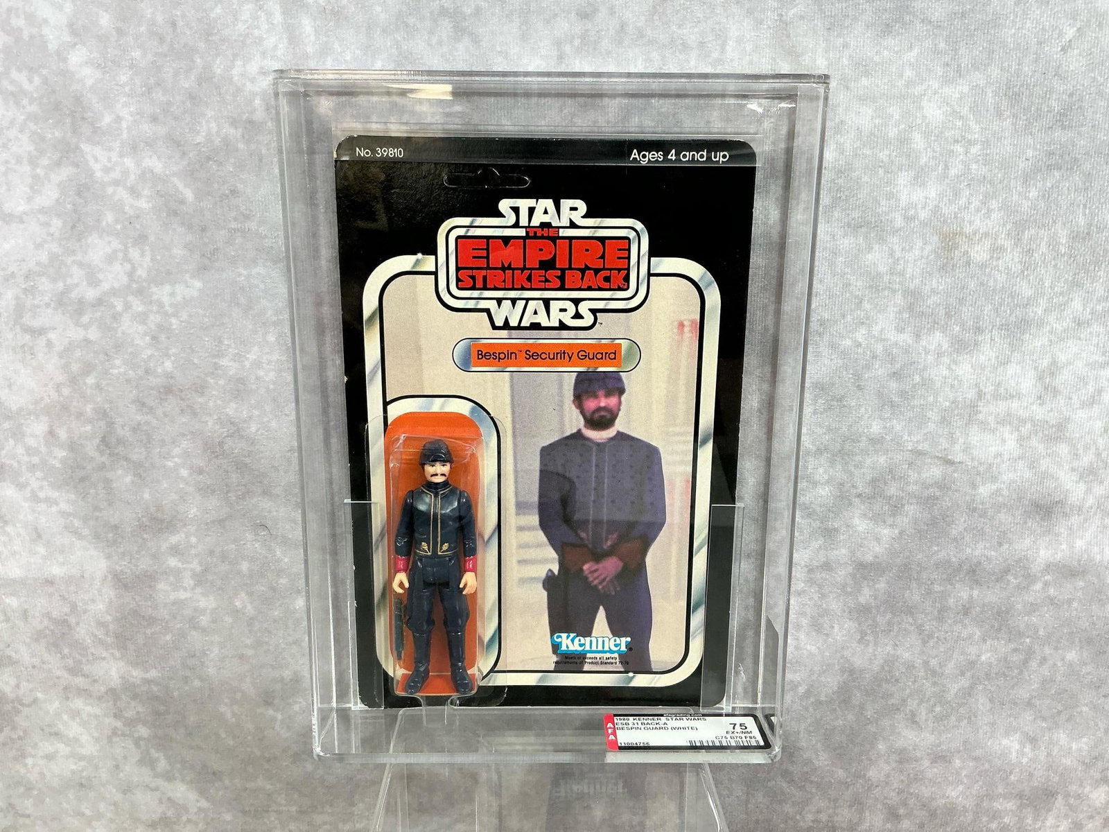 Bespin Security Guard 75 EX+ NM ESB: 1980, 31 Back-A Empire Strikes Back Bespin Security Guard made by Kenner in Hong Kong. AFA graded 75 EX+/NM with subgrades: C75 B70 F85. Card is unpunched. Case measures 7.25 inches wide x 1.5 x 9.75 