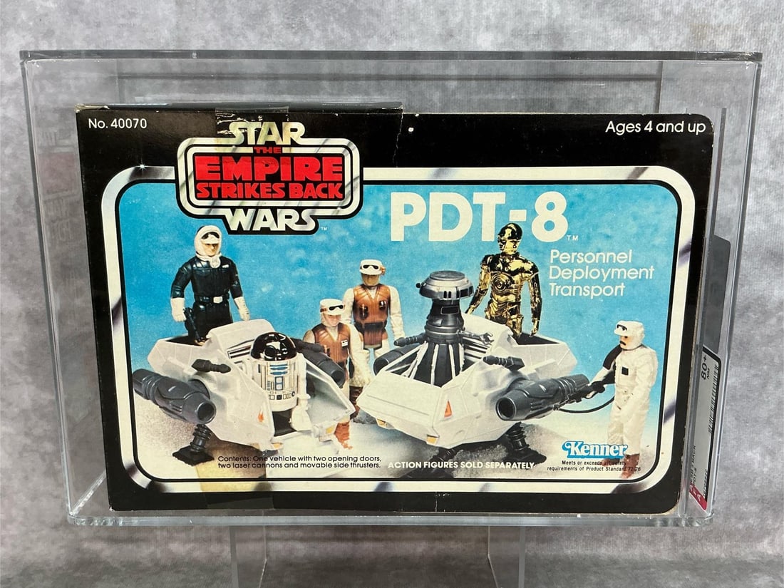 PDT-8 Vehicle 80+ NM ESB: 1981 three back Empire Strikes Back Personnel Deployment Transport vehicle made by Kenner. AFA graded 80+ NM, highest graded example on record at time of listing. Case measures 10.25 inches wide x 4.2
