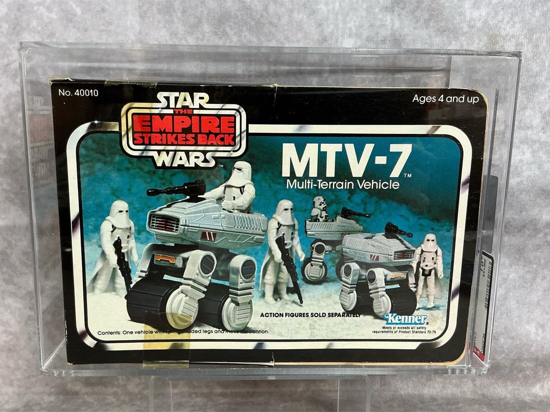 MTV-7 75+ EX+/NM ESB: 1981 three back MTV-7 Multi-Terrain Vehicle Empire Strikes Back made by Kenner. AFA graded 75+ EX/NM, only three with higher grade in population at time of listing. Case measures 10.25 inches wide x 4