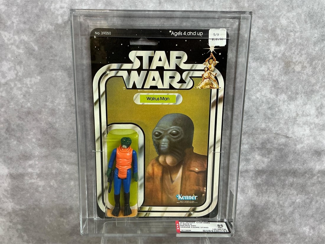 Walrus Man 85 NM+: 1979, 21 Back-A Star Wars Walrus Man with orange figure stand made by Kenner in Hong Kong. AFA graded85 NM+ with subgrades: C85 B85 F85. Only two in population with none higher at time of listing.