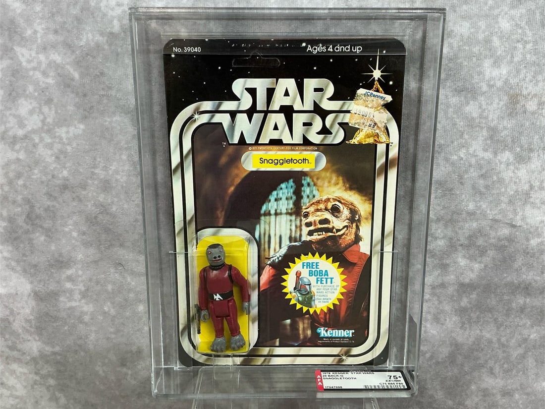 Snaggletooth 75+ EX+/NM: 1978, 20 Back- G, Snaggletooth Star Wars figure made by Kenner in Hong Kong. AFA graded 75+ EX+/NM, with subgrades: C75 B85 F80. Card is unpunched. Case measures 7.25 inches wide x 1.5 x 9.75 inches