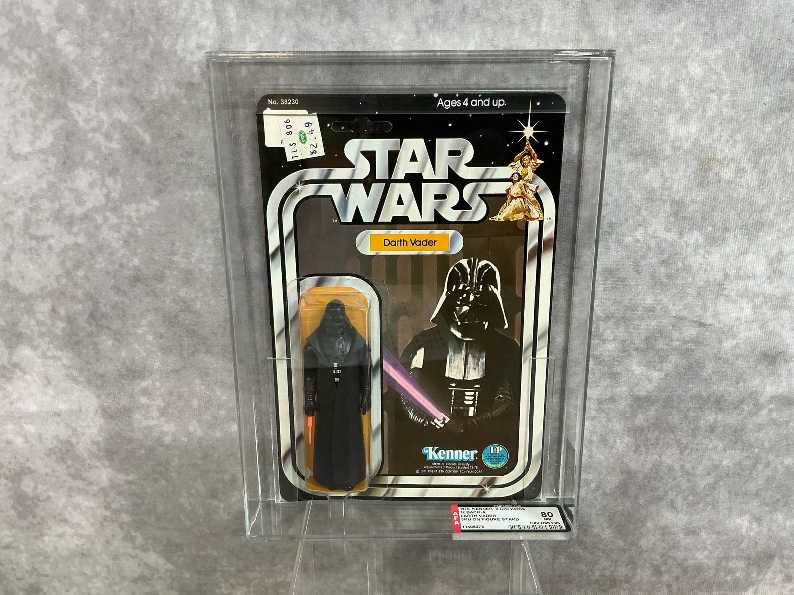 Darth Vader Sku 80 NM: 1978, 12 Back-A SKU on figure stand Star Wars Darth Vader made by Kenner in Hong Kong. AFA graded 80 NM with subgrades: C80 B80 F85. Card in unpunched. Case measures 7.25 inches wide x 1.5 x 9.75