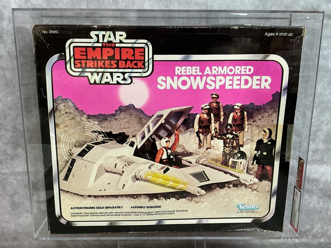 Rebel Armored Snowspeeder 70 EX+ ESB: 1980 pink background variant Rebel Armored Snowspeeder from The Empire Strikes Back, made by Kenner. AFA graded 70 EX+. Case measures 14.75 inches wide x 4.25 x 12 inches tall.