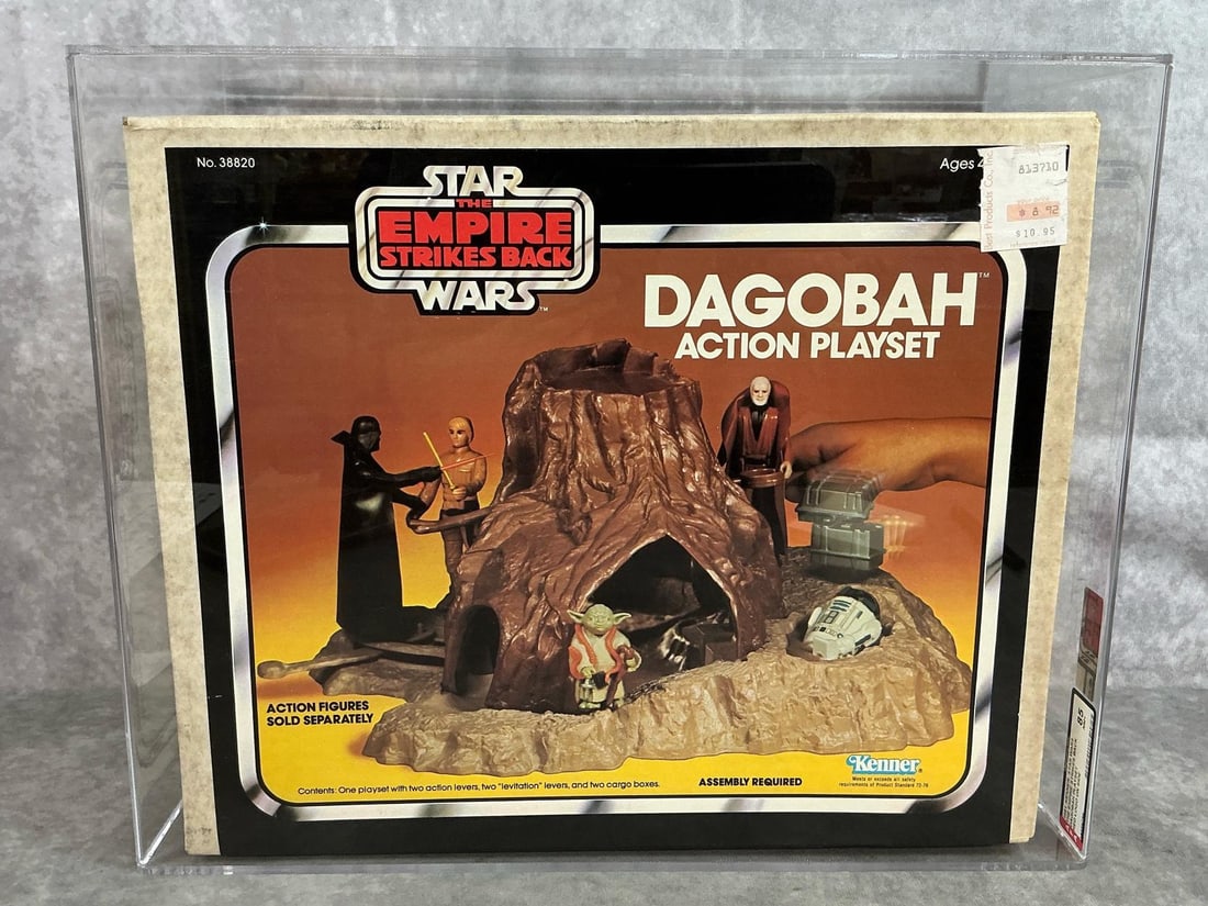 Dagobah Playset 85 NM+ ESB: 1981 Dagobah Action Playset with red logo on side from The Empire Strikes Back, made by Kenner. AFA graded 85 NM+. No higher grade in population at time of listing. Case measures 15.5 inches wide x 8