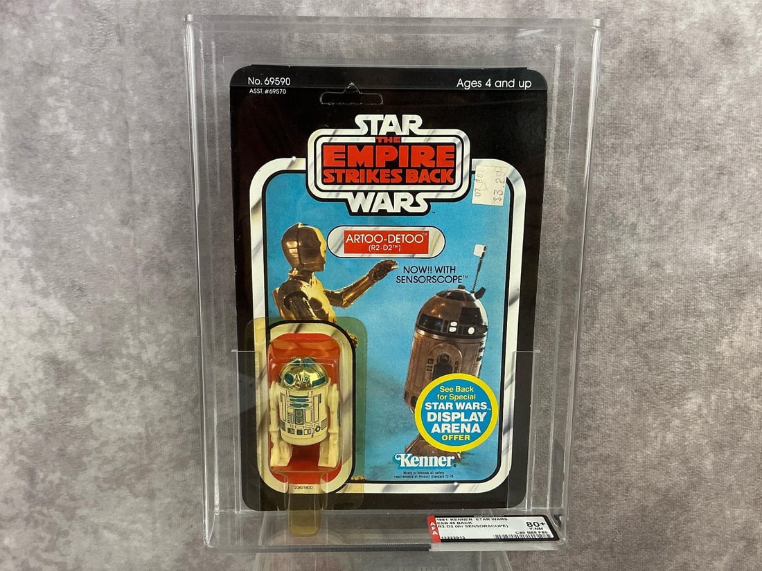 Artoo-Detoo ESB 80+ Y-NM: 1981, 45 back, R2-D2 with sensorscope Empire Strikes Back made by Kenner in Hong Kong. AFA graded 80+ Y-NM with subgrades C80 B85 F80. Card is unpunched. Case measures 7.25 inches wide x 1.5 x 9.75 in