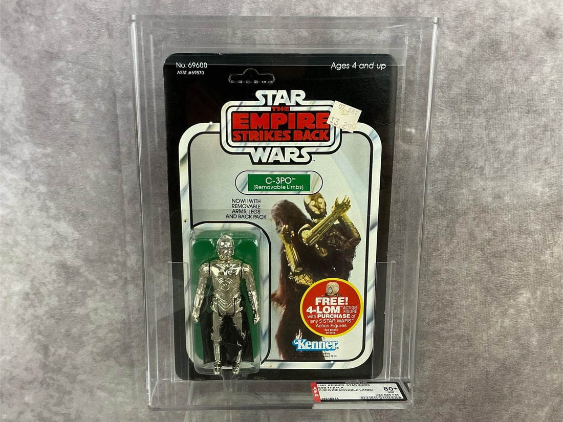C-3PO Removable Limbs ESB 80+: 1982, 47 back, C-3PO with removable limbs Empire Strikes Back made by Kenner in Hong Kong. AFA graded 80+ NM with subgrades: C80 B85 F85. Card is unpunched. Case measures 7.25 inches wide x 1.5 x