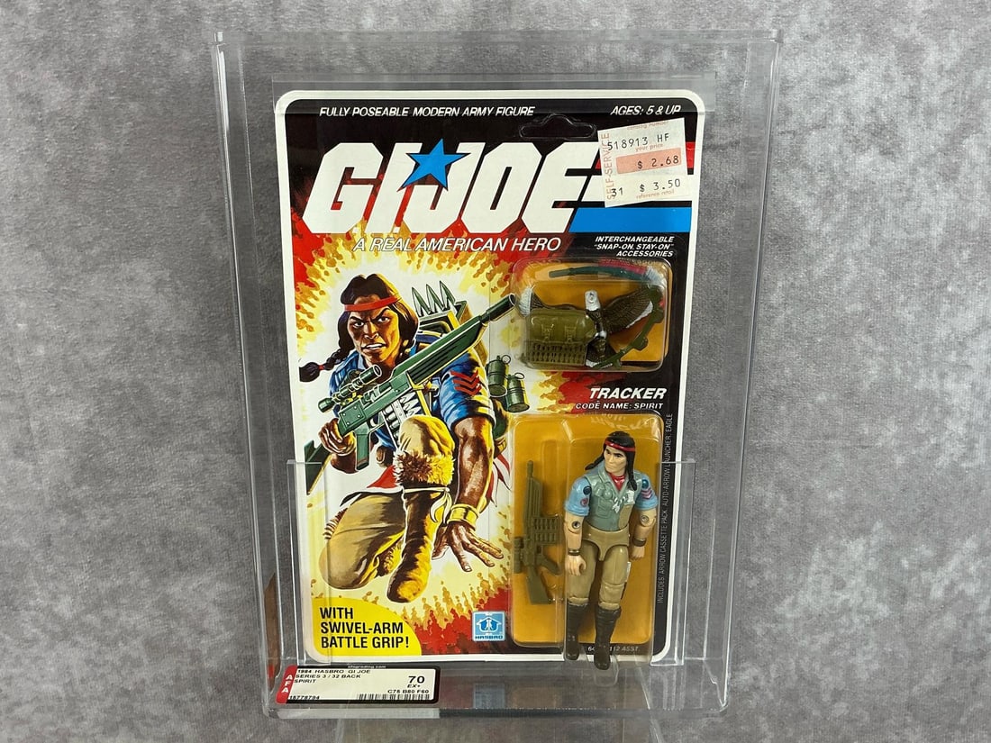 Spirit GI Joe 70 EX+: 1984 series three 32 back G.I. Joe Spirit made by Hasbro in Hong Kong. AFA graded 70 EX+ with subgrades: C75 B80 F60. Card is unpunched. Case measures 7.25 inches wide x 1.5 x 9.75 inches tall.