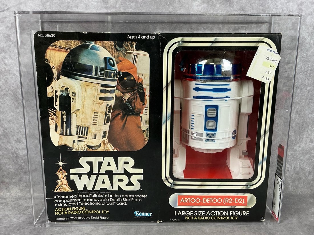 R2-D2 12 inch Series 80 NM: 1979 Artoo-Detoo 12 inches series made by Kenner. AFA graded 80 NM with subgrades: B75 W90 F90. Case measures 13.5 inches wide x 3.75 x 11 inches tall.