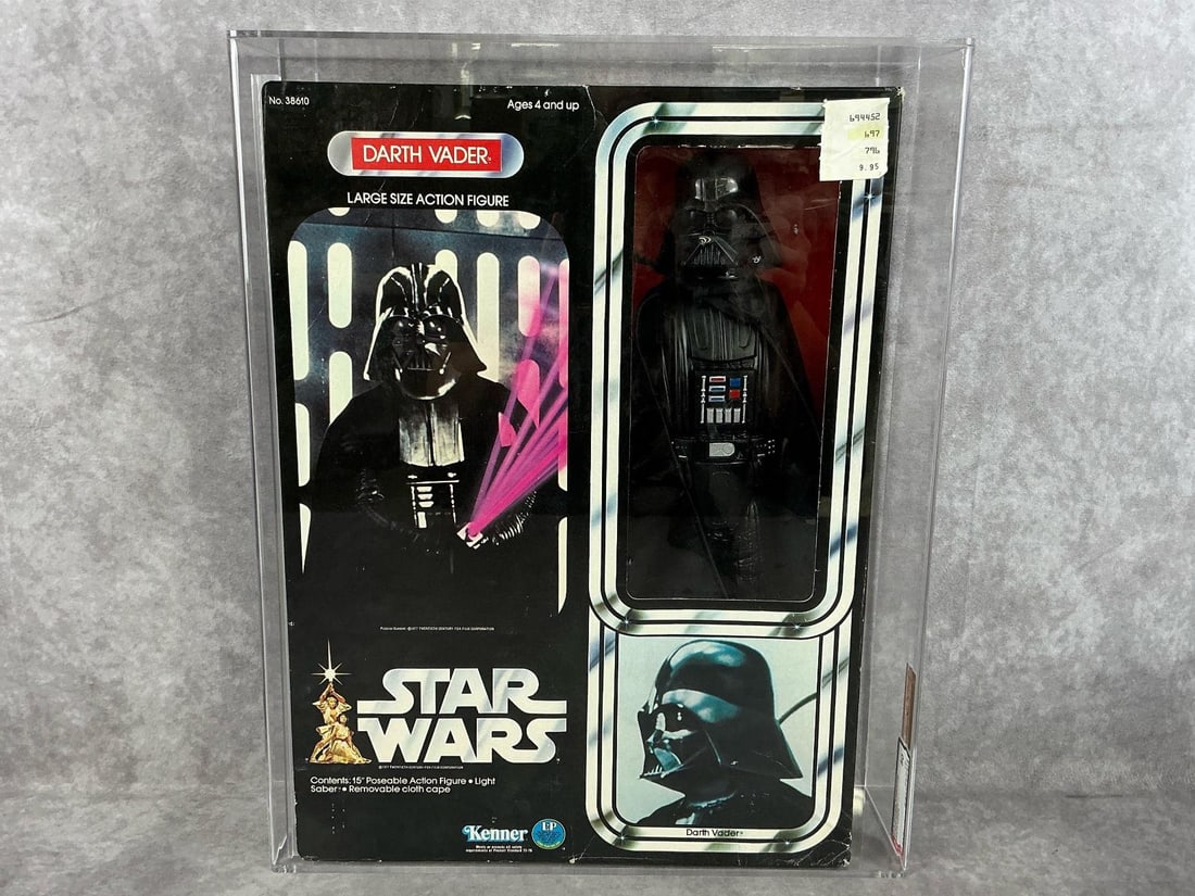 Darth Vader 12 Inch Series 50 VG: 1978 Star Wars Darth Vader 12 inch series figure made by Kenner in Hong Kong. AFA graded 50 VG with subgrades: B60 W75 F50. Case measures 13.75 inches wide x 4 x 17 inches tall.