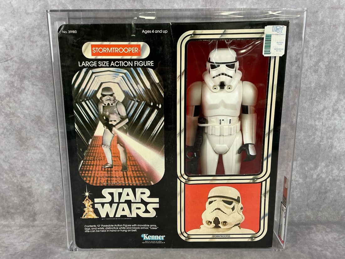 Stormtrooper 12 Inch Series 80 NM: 1979 Star Wars Stormtrooper 12 inch series made by Kenner in Hong Kong. AFA graded 80 NM with subgrades: B80 W85 F85. Case measures 13.5 inches wide x 3.75 x 14 inches tall.