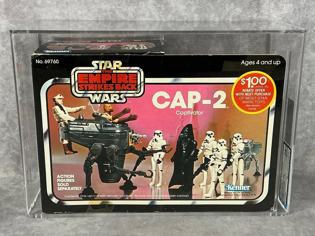 CAP-2 ESB 75+ Q-EX+/NM: 1982 5 back, Star Wars CAP-2 Captivator with rebate offer, Empire Strikes Back. Made by Kenner in Macao. AFA graded 75+ Q-EX+/NM. None higher at time of listing. Case measures 10.25 inches wide x 4 x 