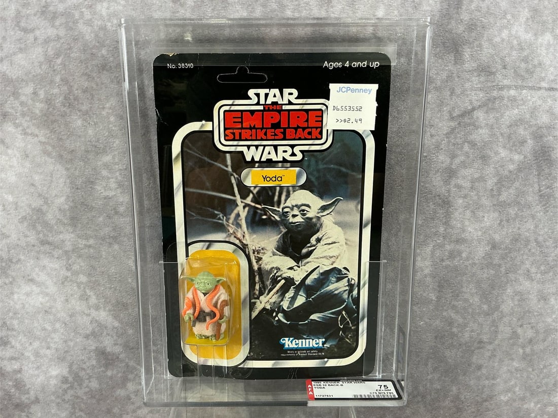 Yoda ESB 75 EX+/NM: 1980, 32 Back-B Star Wars Empire Strikes Back Yoda made by Kenner in Hong Kong. AFA graded 75 EX+/NM with subgrades C75 B75 F85. Card is unpunched. Case measures 7.25 inches wide x 1.5 x 9.75 inches