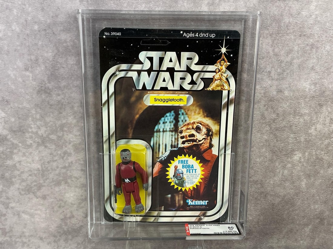 Snaggletooth 80+ NM: 1978, 20 Back-G Star Wars Snaggletooth made by Kenner in Hong Kong. AFA graded 80 NM with subgrades C75 B85 F80. Card is unpunched. Only one at grade level at time of listing. Case measures 7.25