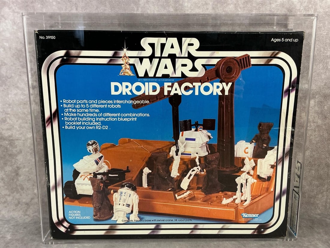 Droid Factory 80 Q-NM: 1979 Star Wars Droid Factory playset made by Kenner. AFA graded 80 Q-NM. Case measures 14.25 inches wide x 3.5 x 12 inches tall.