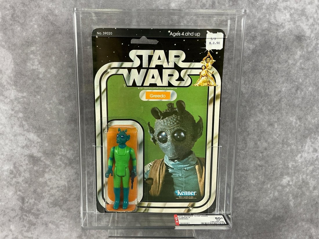 Greedo 80+ NM: 1979, 21 Back-A Star Wars Greedo action figure made by Kenner in Hong Kong. AFA graded 80+ NM with subgrades C80 B85 F85. Case measures 7.25 inches wide x 1.5 x 9.75 inches tall.