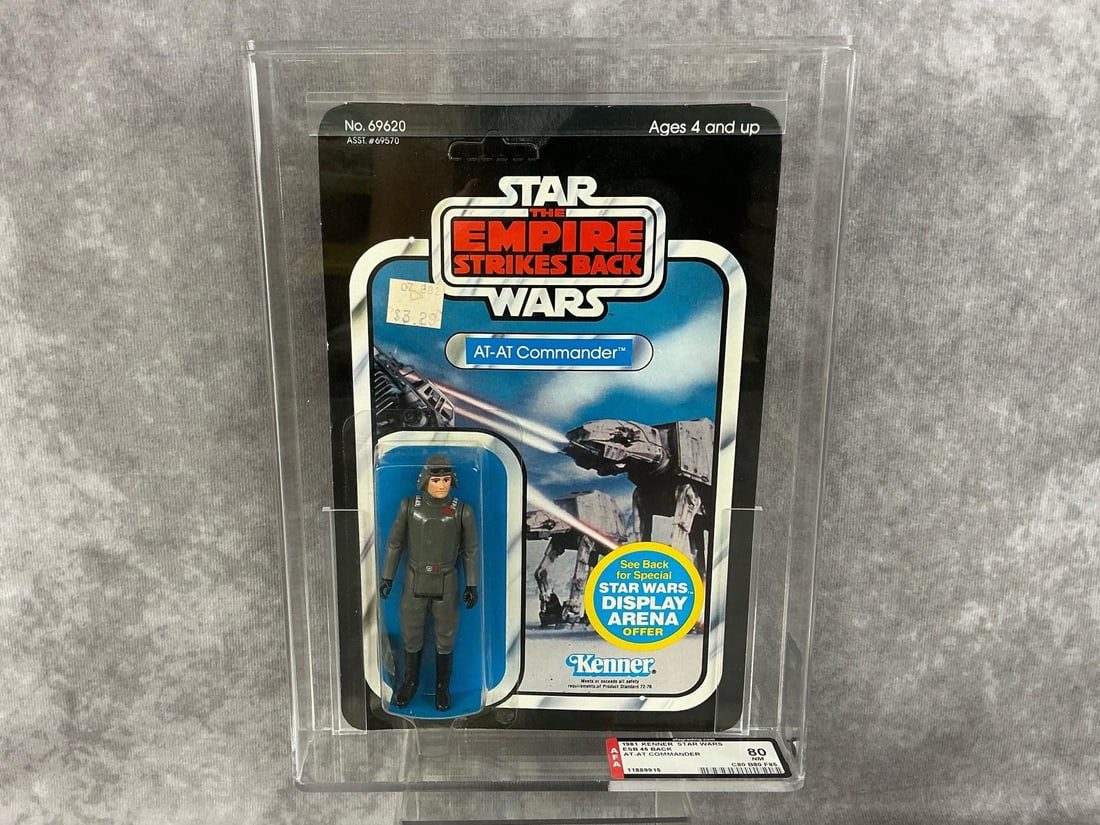 AT-AT Commander 80 NM: 1981, 45 Back Star Wars The Empire Strikes Back AT-AT Commander made by Kenner in Hong Kong. AFA graded 80 NM with subgrades C80 B80 F85. Card is unpunched. Case measures 7.25 inches wide x 1.5 x 9.75