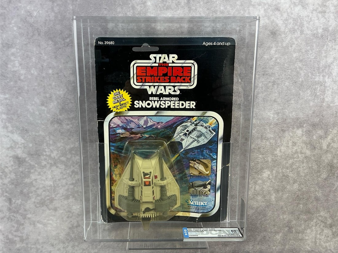 Rebel Armored Snowspeeder ESB 60 Y-EX: 1980, 11 Back-B Star Wars The Empire Strikes Back diecast Rebel Armored Snowspeeder made by Kenner in Hong Kong. DCA graded 60 Y-EX with subgrades C60 B85 V90. Case measures 8.25 inches wide x 2 x 10.