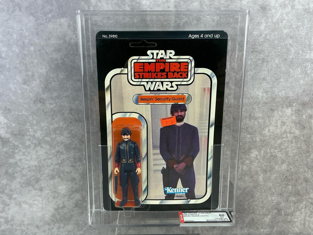 Bespin Security Guard (White) ESB 80 NM: 1980, 31 Back-A Star Wars The Empire Strikes Back Bespin Security Guard (White) action figure made by Kenner in Hong Kong. AFA graded 80 NM with subgrades C75 B80 F80. Card is unpunched. Case measures