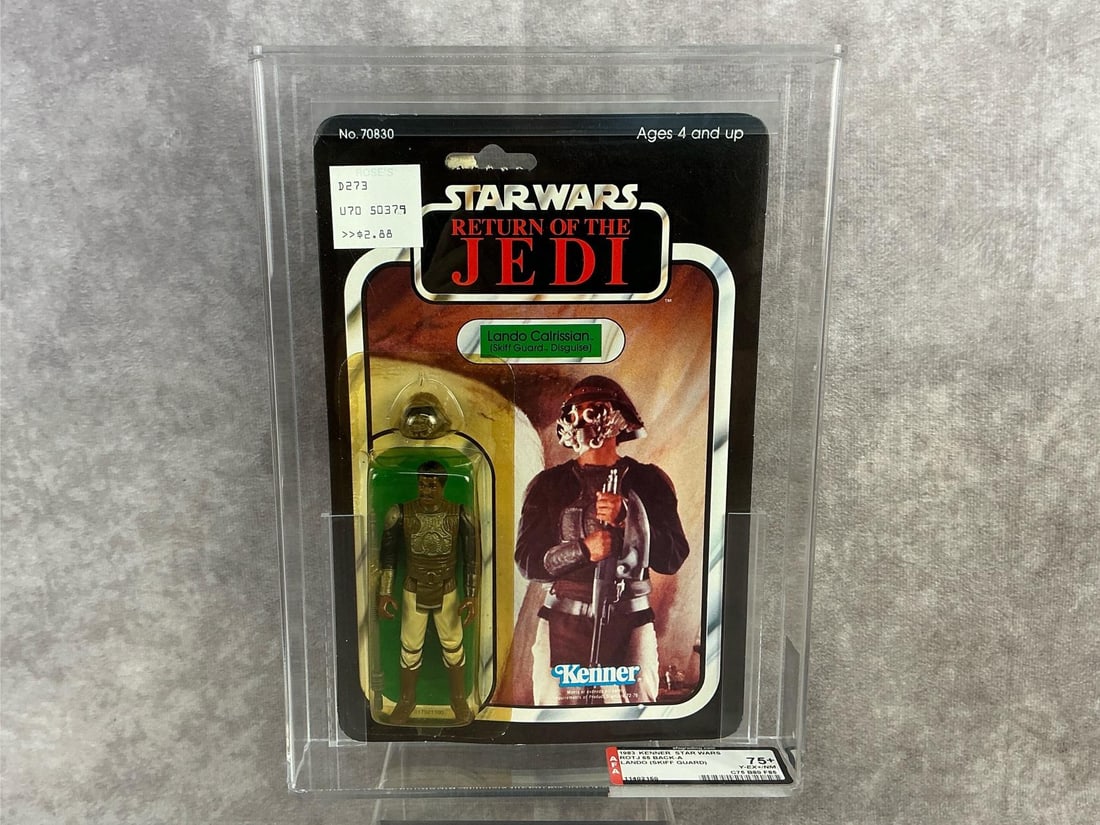 Lando Calrissian (Skiff Guard Disguise) ROTJ 75+ Y-EX+/NM: 1983, 65 Back-A Star Wars Return of the Jedi Lando Calrissian (Skiff Guard Disguise) action figure made by Kenner in Hong Kong. AFA graded 75+ Y-EX+/NM with subgrades C75 B80 F85. Case measures 7.25