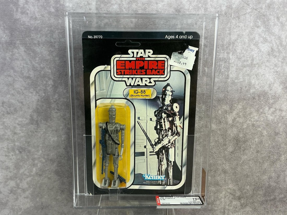 IG-88 ESB 70+ EX+: 1980, 32 Back-A Star Wars The Empire Strikes Back IG-88 action figure made by Kenner in Hong Kong. AFA graded 70+ EX+ with subgrades C70 B85 F80. Card is unpunched. Case measures 7.25 inches wide x 1.