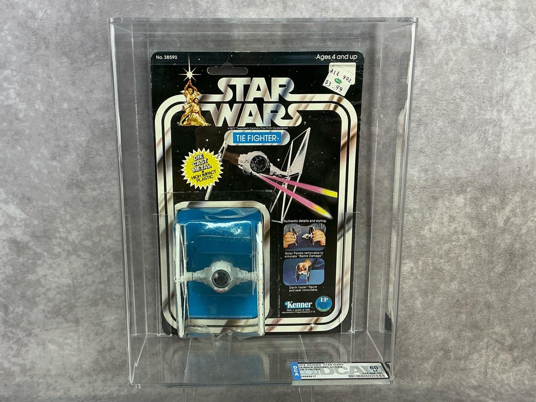 TIE Fighter 60 EX: 1978, 12 Back Star Wars diecast TIE Fighter made by Kenner in Hong Kong. DCA graded 60 EX with subgrades C60 B60 V85. Case measures 8.25 inches wide x 3.25 x 10.75 inches tall.