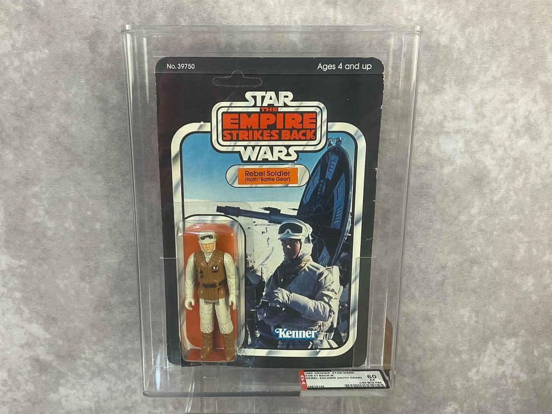 Rebel Soldier (Hoth Battle Gear) ESB 60 EX: 1980, 31 Back-B Star Wars The Empire Strikes Back Rebel Soldier (Hoth Battle Gear) action figure made by Kenner in Hong Kong. AFA graded 60 EX with subgrades C60 B75 F80. Card is unpunched. Case