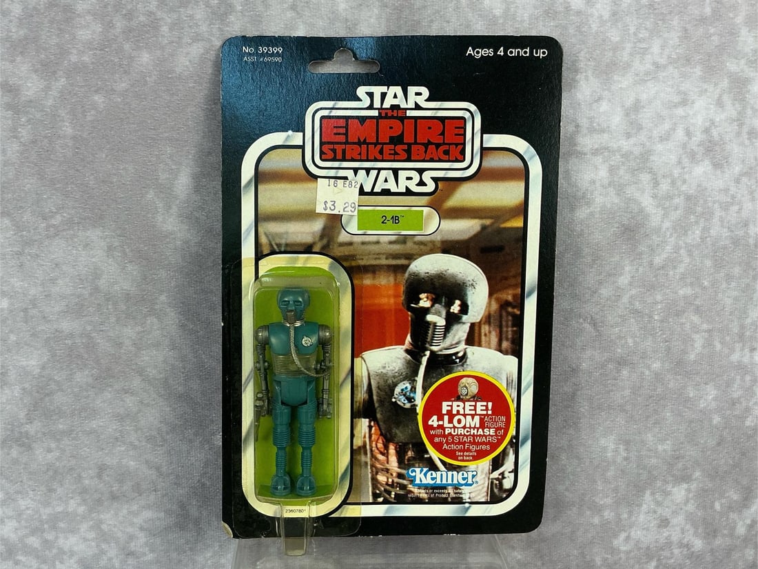 2-1B ESB Figure: 1982, 47 Back Star Wars The Empire Strikes Back 2-1B figure made by Kenner in Hong Kong. Yellowing to blister but in good condition, bowing and a damaged corner on card back. Measures 6 inches wide x 