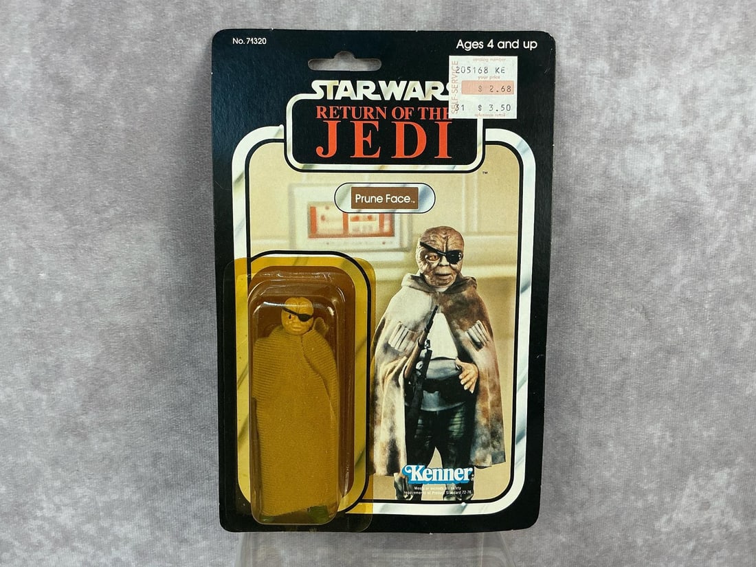 Prune Face ROTJ: 1983, 77 Back-A, Star Wars Return of the Jedi Prune Face figure made by Kenner in Hong Kong. Yellowing to blister but in good condition, card back is bowed. Measures 6 inches wide x 9 inches tall.