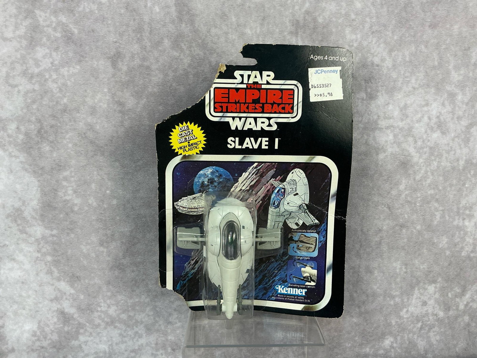 Slave I Die Cast Vehicle ESB: 1980 Star Wars The Empire Strikes Back Slave I die cast vehicle made by Kenner. Blister in good condition, card back is in poor condition. Measures 6 inches wide x 9 inches tall.