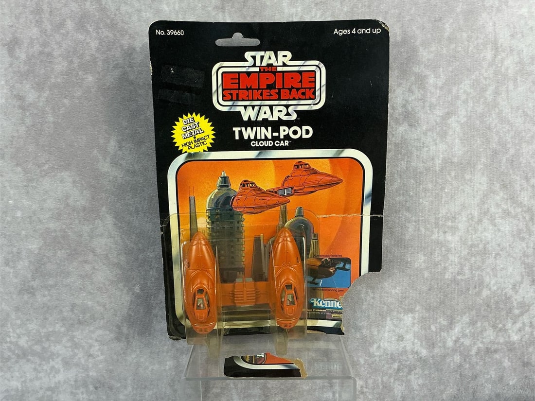 Twin-Pod Cloud Car ESB: 1980, 11 Back-B, Star Wars The Empire Strikes Back Twin Pod die cast vehicle made by Kenner in Hong Kong. Damage to blister and card back. Measures 6 inches wide x 9 inches tall.