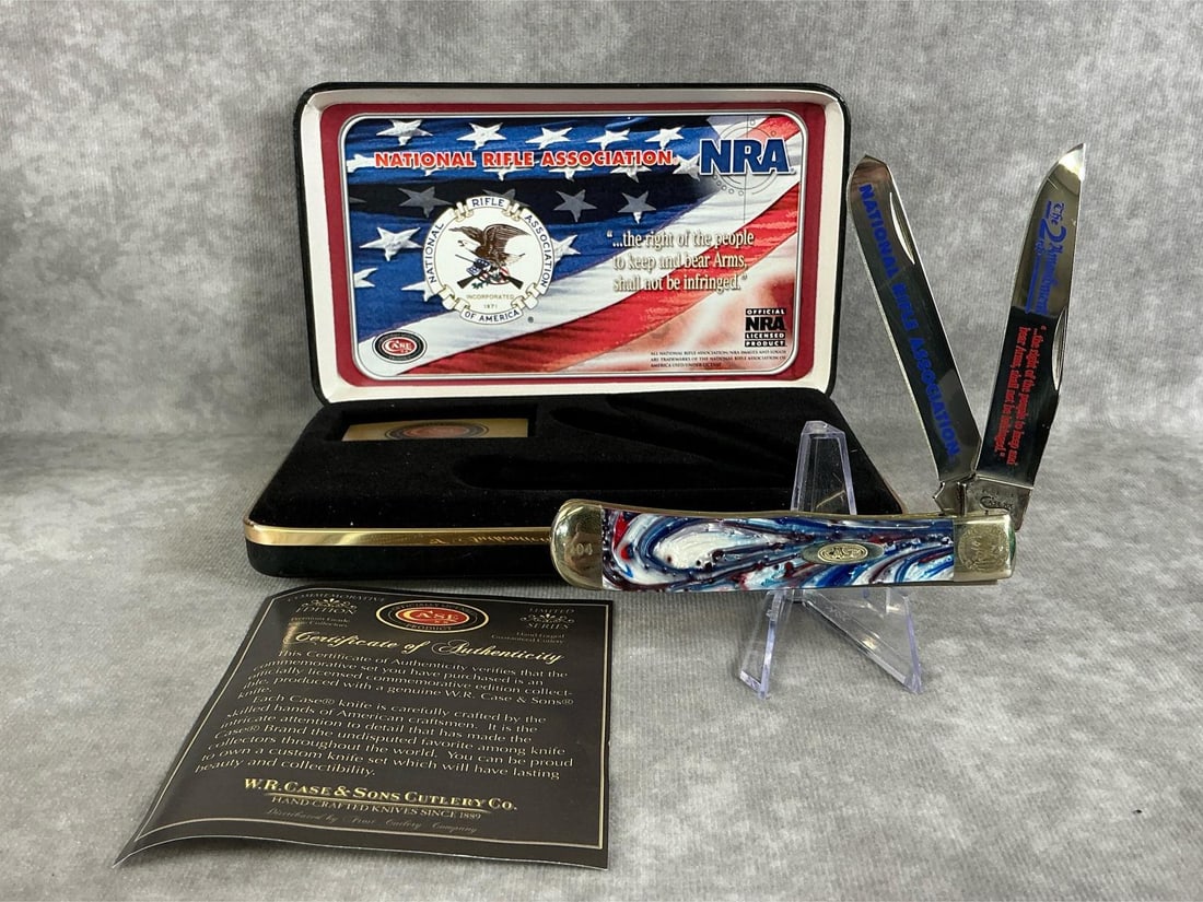 NRA Case XX Knife: 2014 Case XX Trapper two blade pocketknife with Corelon handle and original box, 9254 SS. Tight snap, good condition. Box measures 7 inches wide x 1.25 x 4.25 inches tall.