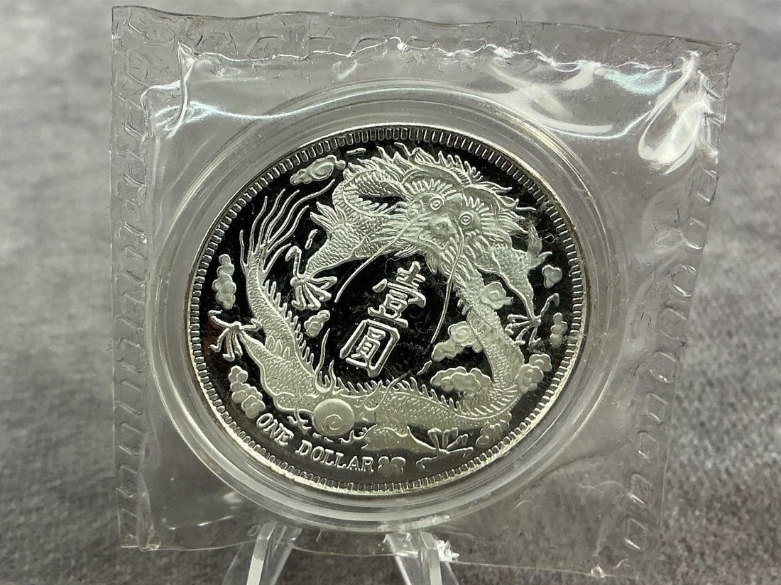Dragon Dollar: 2019 China long whiskered dragon dollar. Uncirculated and contains .999 fine silver. Total weight 1 ozt.