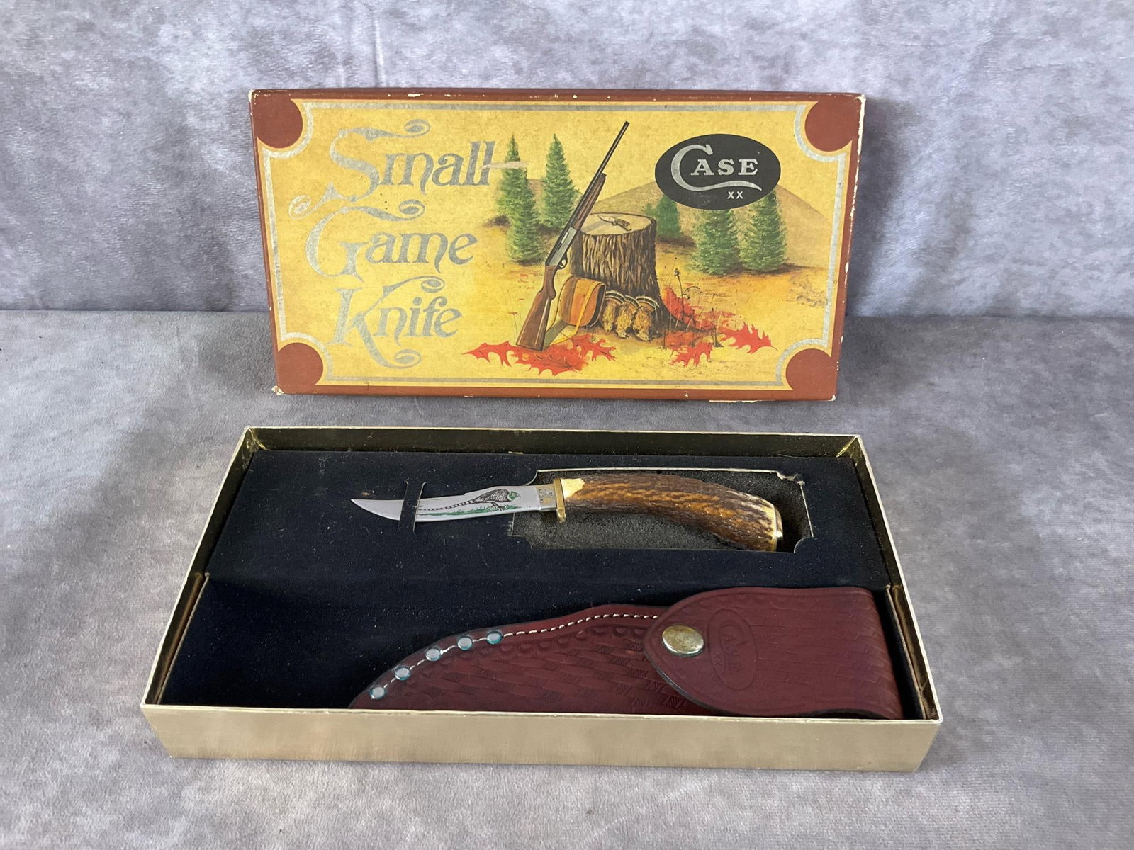 Game Pheasant Knife: Case XX small Game Pheasant Knife. Fixed blade, patterned 523-3 1/4, comes in original box with sheath. Box measures 10.5 inches wide x 5.5 inches tall.
