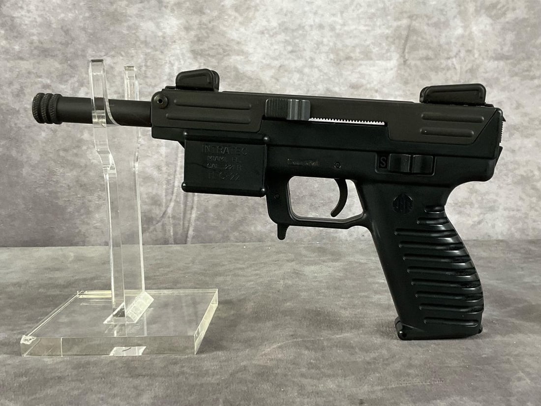 Intratec TEC-22 Pistol And Magazines: Serial # 058537.22LR TEC-22 pistol with case and Butler Creek magazines by Intratec, color matte black. In fair condition with surface wear, minor scuffs, and oxidation on the serial plate. Barrel