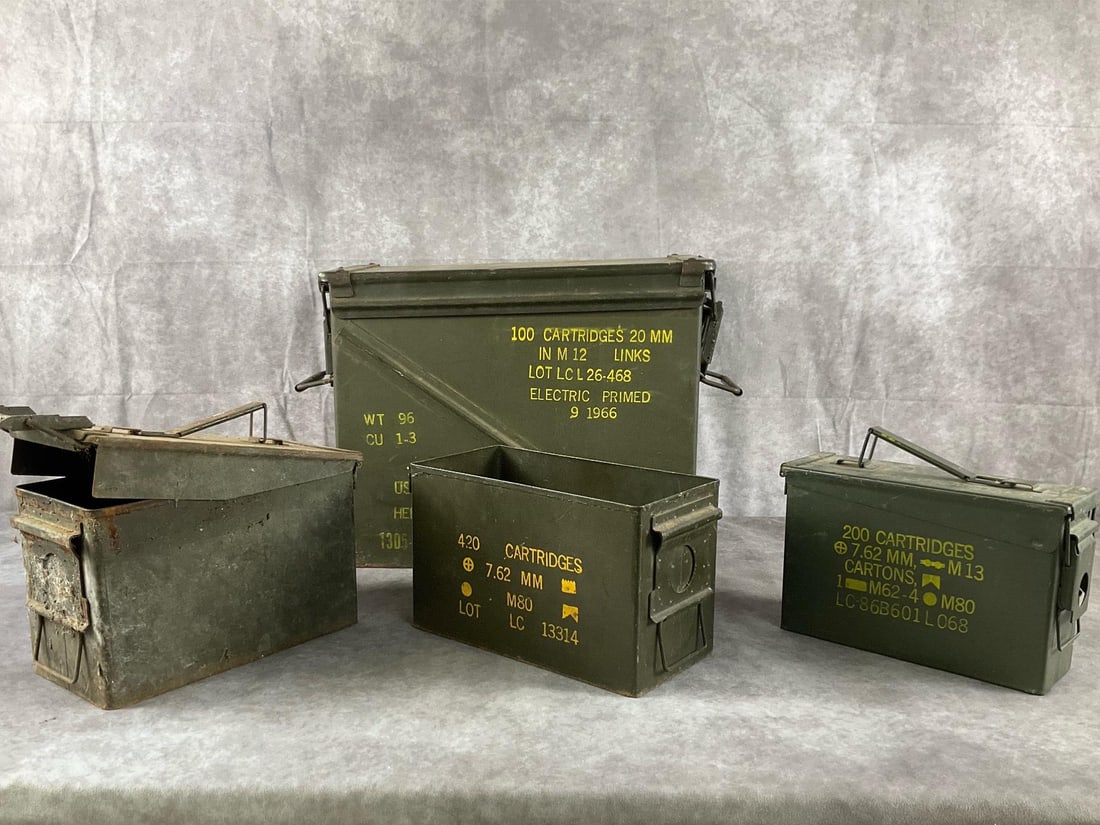 Lake City Military Surplus Ammunition Cans: Assorted 20mm and 7.62mm steel military ammunition cans by Lake City Army Ammunition Plant in olive drab finish. In fair to poor condition with heavy surface rust, corrosion, scuffs, and missing or