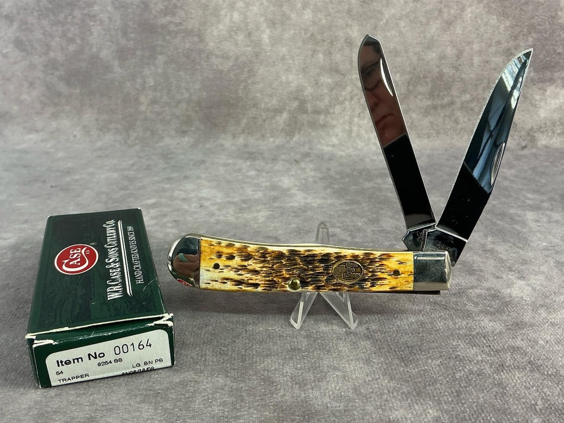 Bass Pro Shop Knife: Case XX Bass Pro Shop knife. Trapper, patterned 6254ss, tight snap and comes with original box. Box measures 4.5 inches wide x 1.75 inches tall.