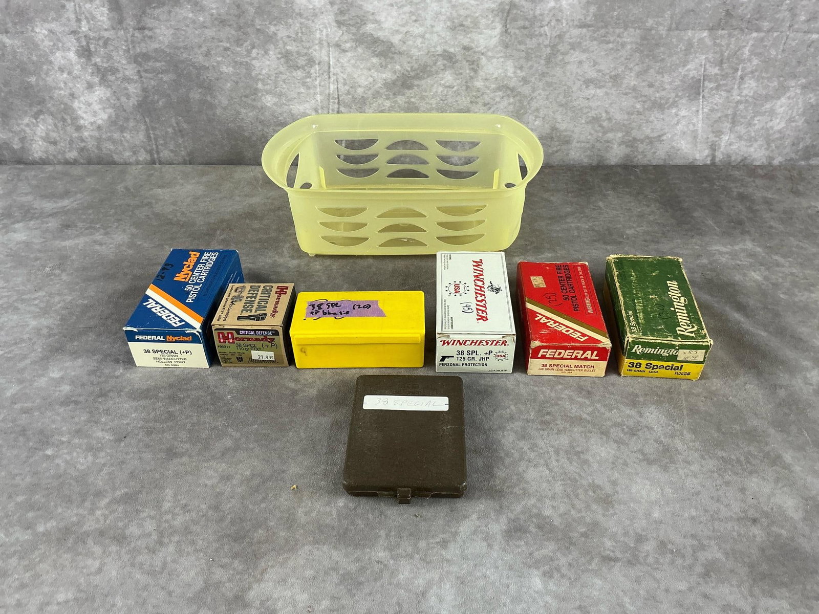 .38 Special Federal, Winchester, Hornady, Remington Ammunition: 113 total .38 Special ammunition lot by Federal, Winchester, Hornady, and Remington in brass and nickel. In good condition. Container measures 12 inches long X 8 inches wide X 4 inches high.