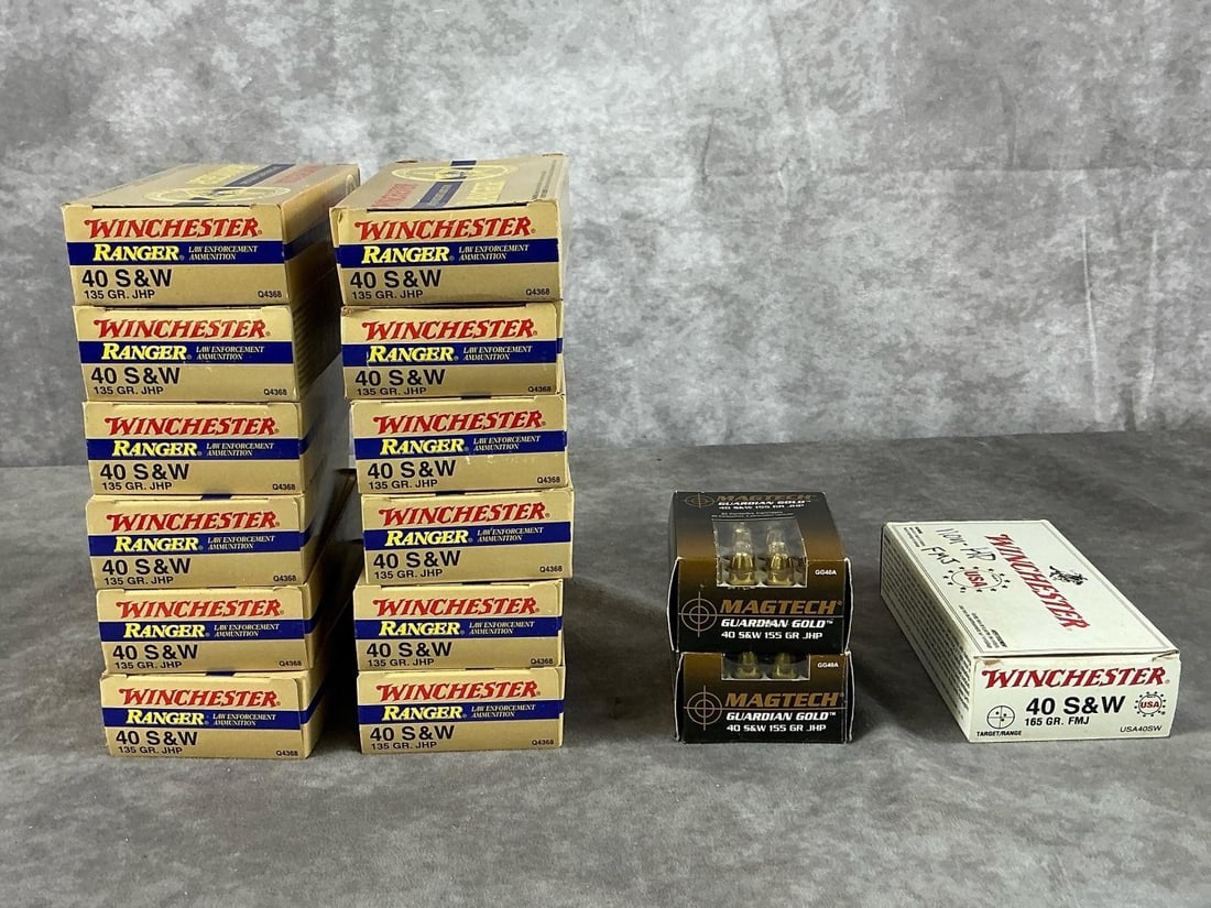 Winchester and Magtech 40 S&W Ammunition: 698 total 40 S&W Winchester Ranger 135 grain JHP, Magtech Guardian Gold 155 grain JHP, and Winchester 165 grain FMJ ammunition. In good condition with clean, unfired brass casings. Box measures 6 1/2