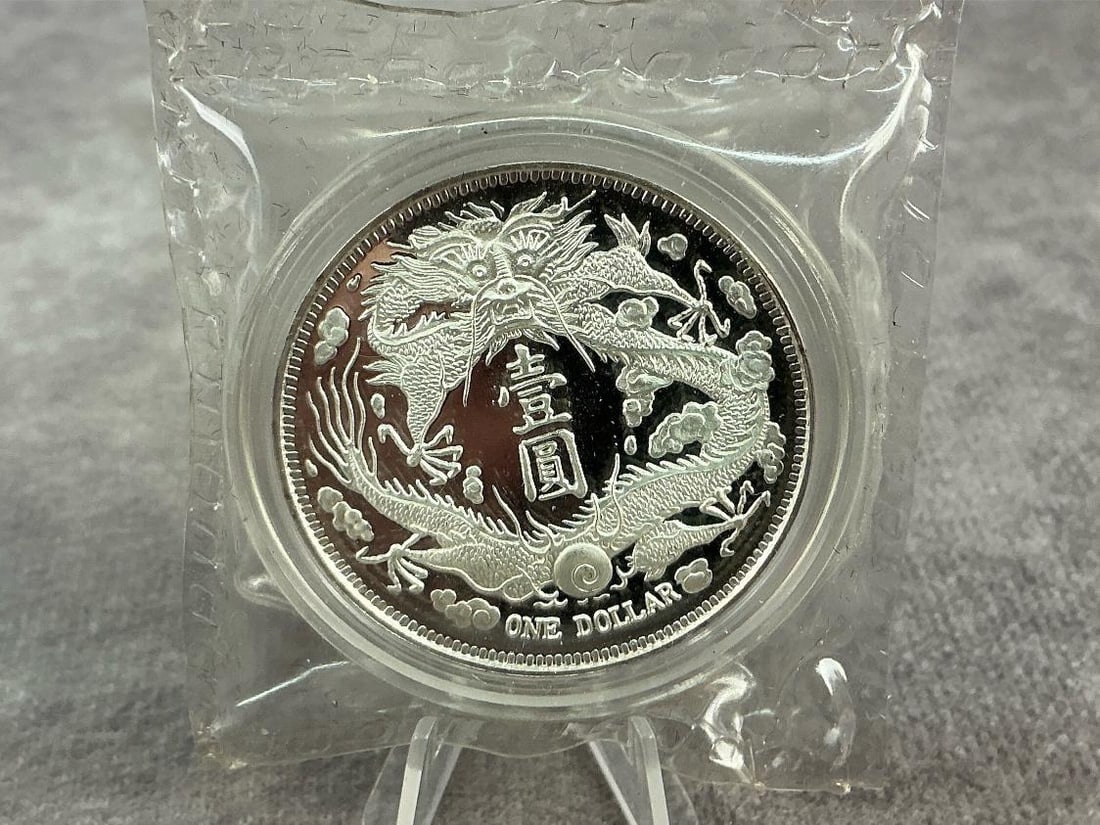 Dragon Dollar: 2019 China long whiskered dragon dollar. Uncirculated and contains .999 fine silver. Total weight 1 ozt.