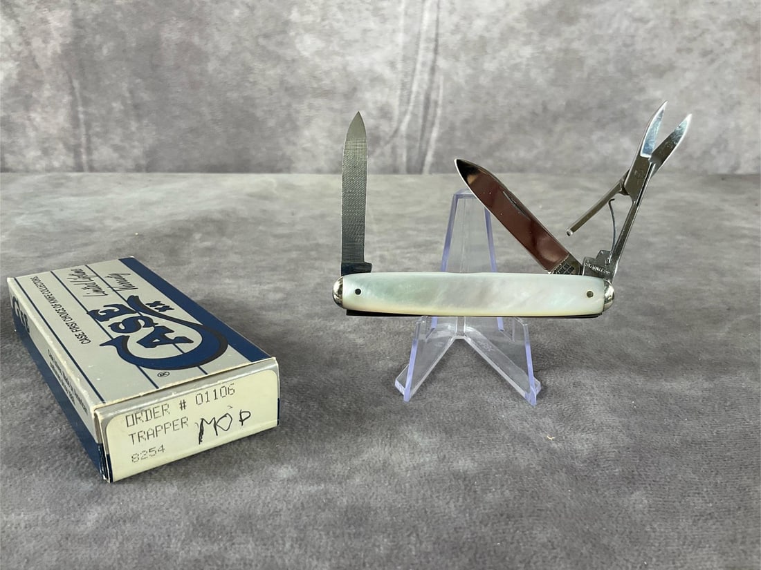 Senators Pen Knife: 1971 Case XX knife featuring genuine mother of pearl handles. Senators pen, patterned 8364s, tight snap, in box but not the original. Box measures 4.5 inches wide x 1.75 inches tall.