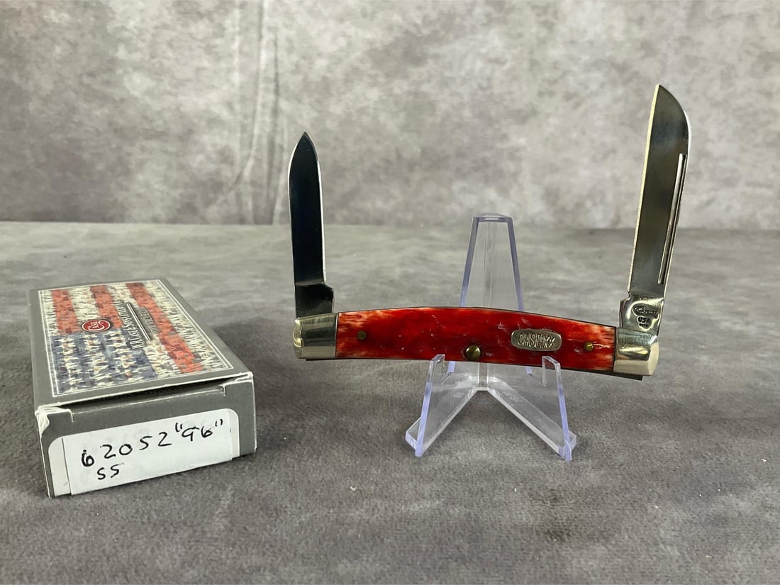 Jigged Bone Knife: Case XX knife. Half Congress, patterned 62052ss, tight snap, box included but not original. Box measures 4.5 inches wide x 1.75 inches tall.