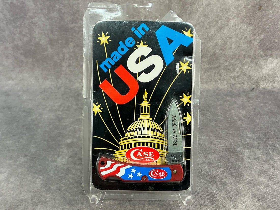 Made in USA Knife: 1997 Case XX commemorative Made in USA knife. Lockback, patterned 225Lss. Unopened, damage to plastic. Original packaging measures 4.25 inches wide x 7.25 inches tall.