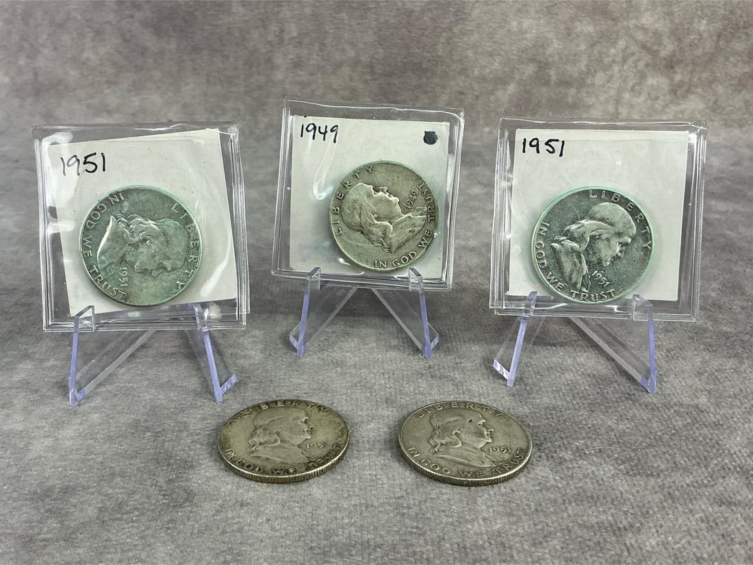 Franklin Halves: Five 1951 Franklin half dollars, 90% silver. All in fair to good circulated condition. Total weight 2.19 ozt.