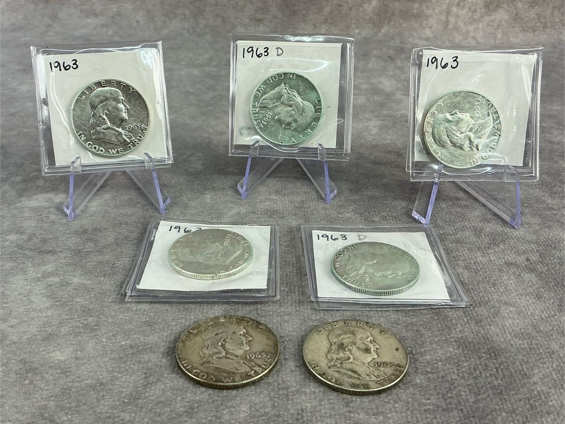 Franklin Halves: Seven 1963 Franklin half dollars, 90% silver. All in fair to good circulated condition. Total weight 3.16 ozt.