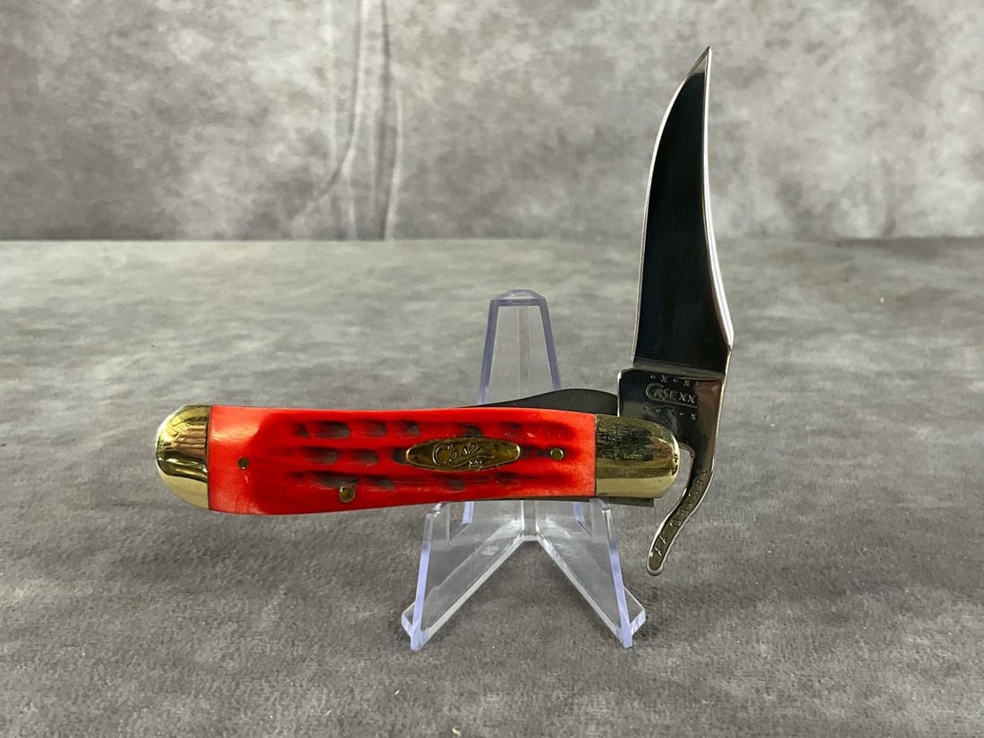 Orange Jigged Bone Knife: Case XX Texas Thoothpck 61953lss. Tight snap. Measures 4 inches closed and 6 inches open.
