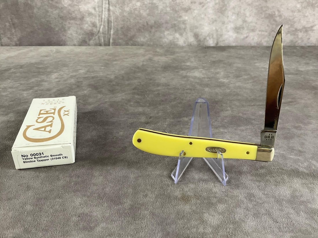 Yellow Synthetic Smooth Knife: Case XX Slimline Trapper 31048 cs. Tight snap, includes original box. Box measures 4.5 inches wide X 1.75 inches tall.