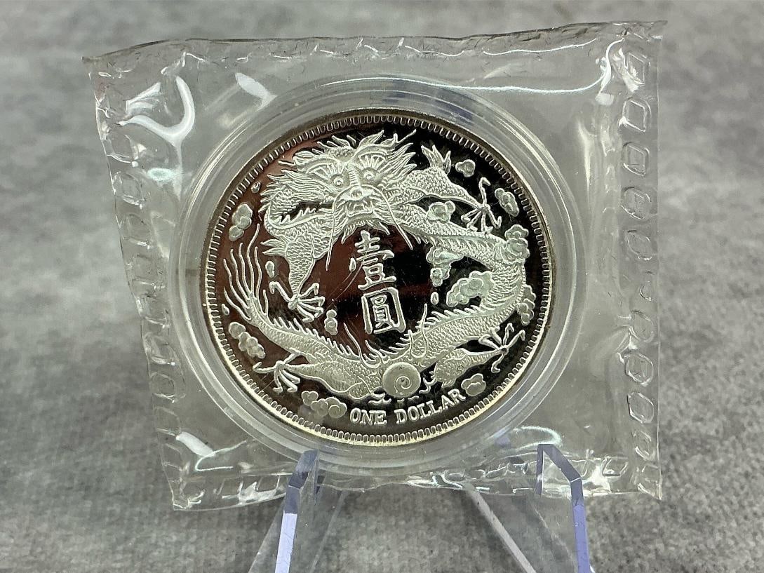 Dragon Dollar: 2019 China long whiskered dragon dollar. Uncirculated and contains .999 fine silver. Total weight 1 ozt.