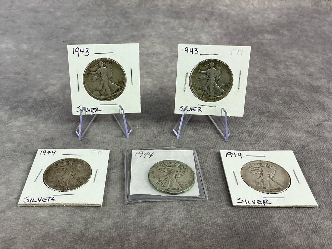 Walking Liberties: Five 1943 through 1944 Walking Liberty Half Dollars. All in good circulated condition. Total weight 2.29 ozt.