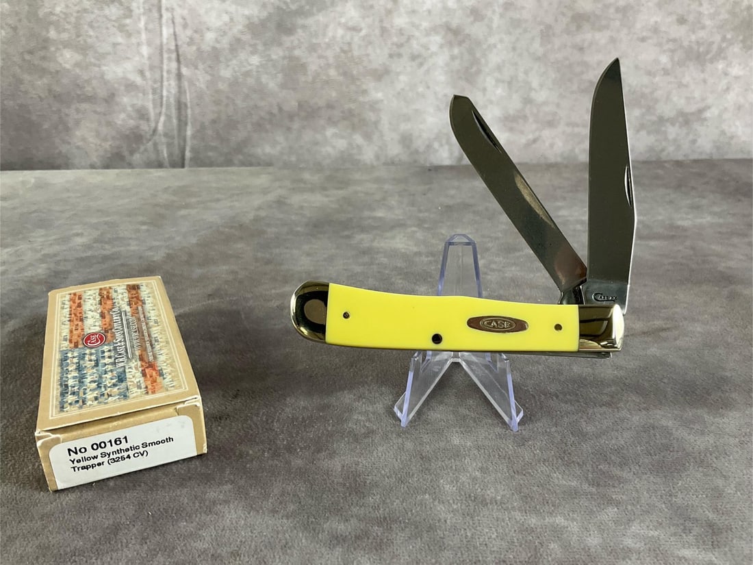 Yellow Synthetic Smooth Knife: Case XX Trapper 3254cv. Tight snap, includes original box. Box measures 4.5 inches wide X 1.75 inches tall.