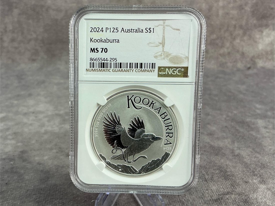 Kookaburra Coin: 2024 Australia Silver Kookaburra coin , MS 70, graded by NGC. Certification number 8665544-295. Measures 2.25 inches wide x 3.25 inches tall.